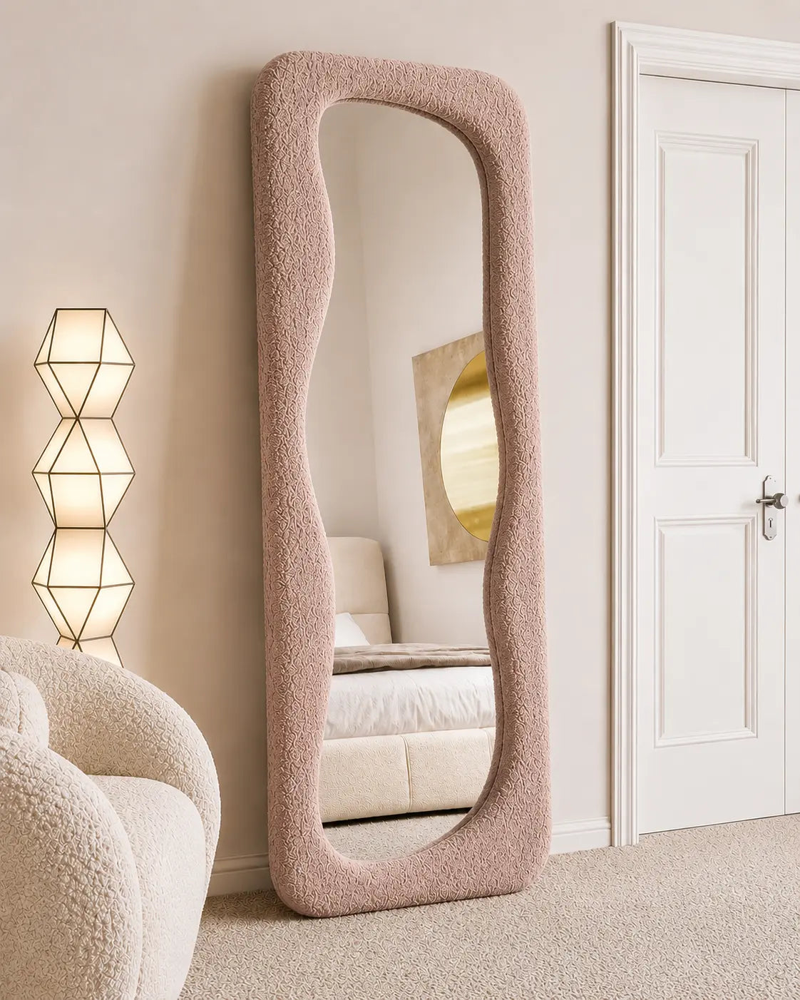 Full-length asymmetric floor standing mirror with a thick beige boucle fabric upholstered frame,