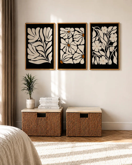 3 panel wall art with floral designs and wooden frames in living room