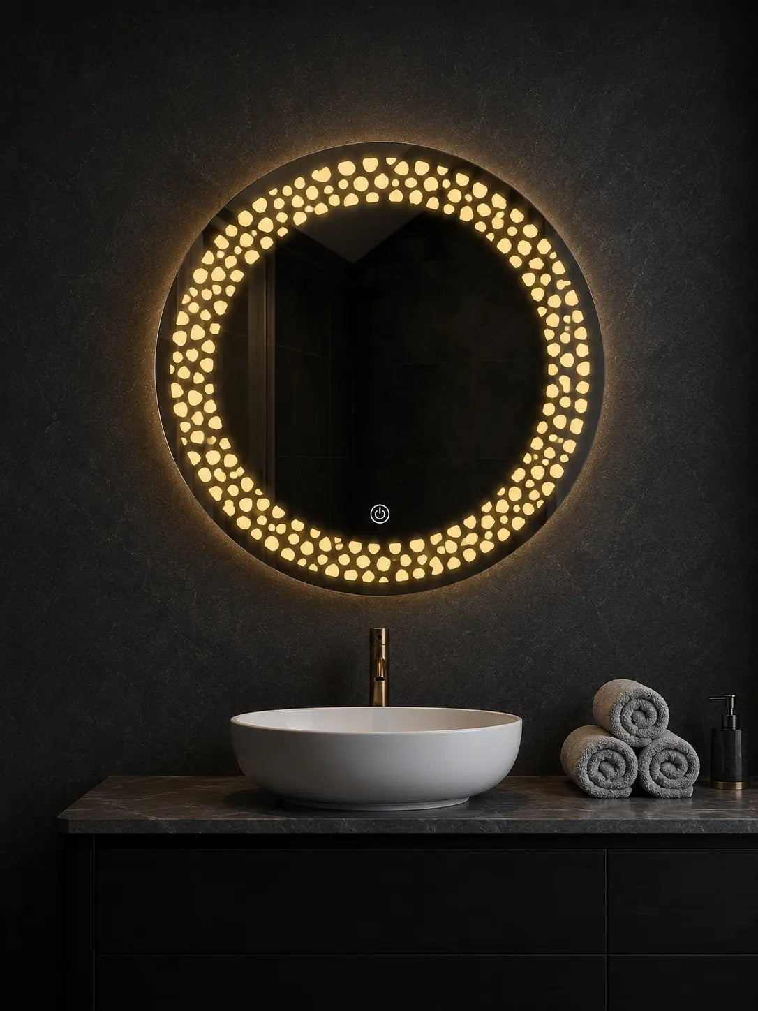round mirror with lights mounted above bathroom vanity with decorative led pattern