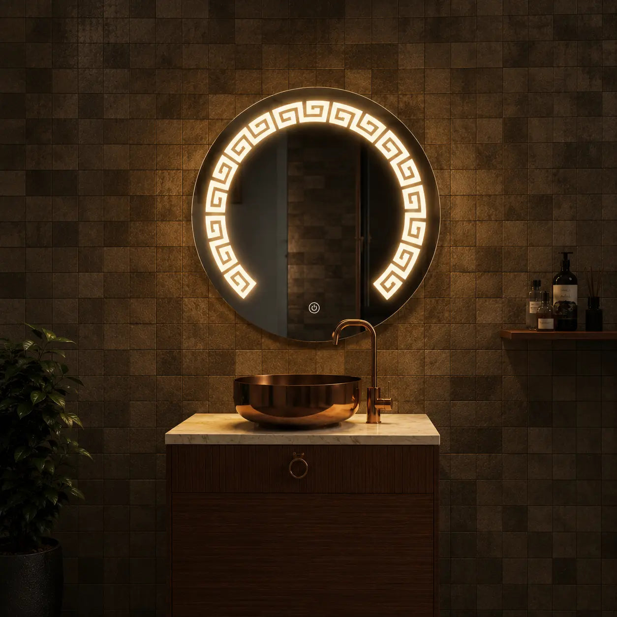 Round illuminated mirror in a bathroom setting with a sink and decorative plant.