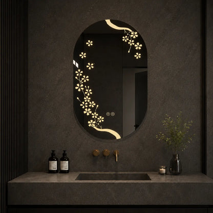 Bathroom mirror with floral design and lighting on a textured wall.