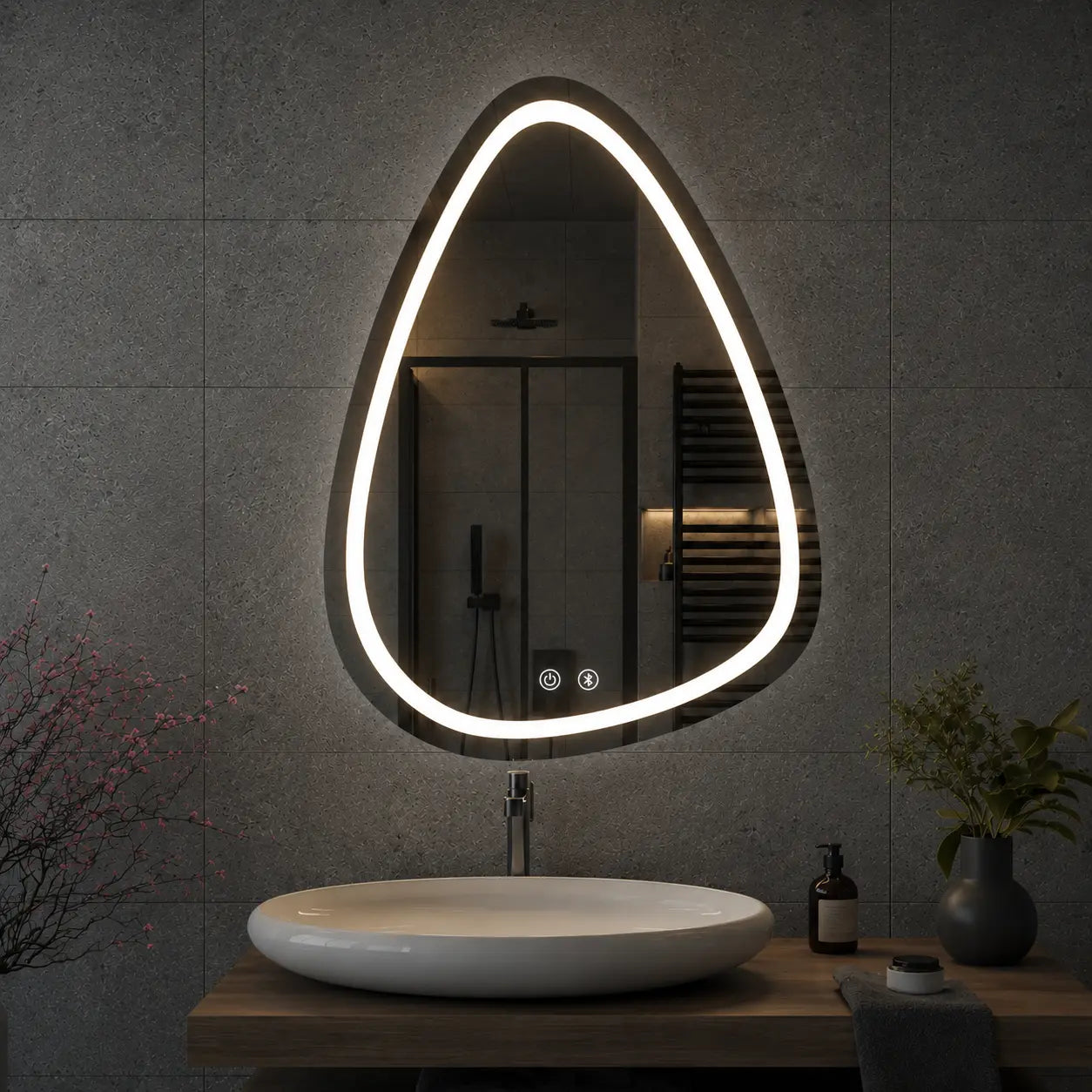 triangular led bathroom mirror with soft white light above round wash basin