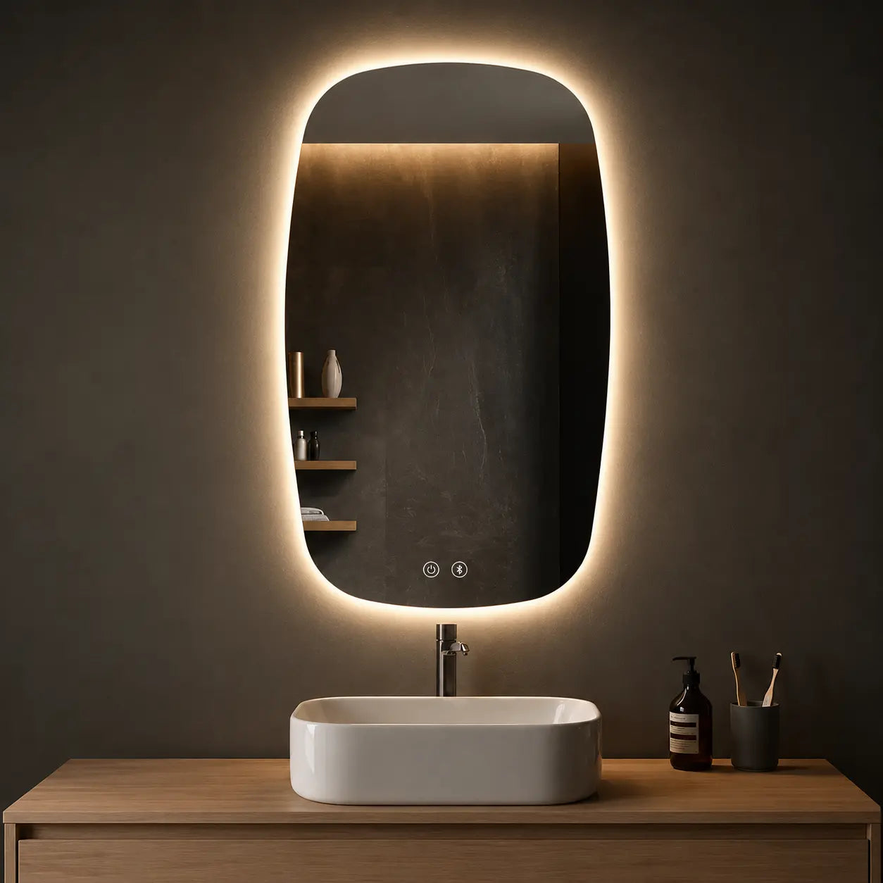 vertical led wall mirror with warm Backlit light above stone bathroom vanity