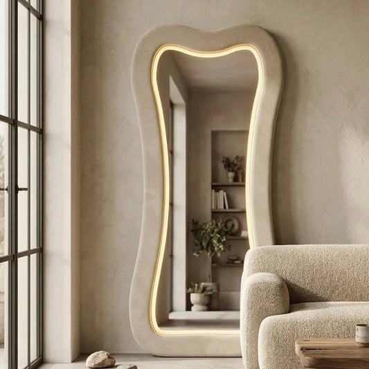 Curved LED mirror with sleek frame for modern bedroom and living room décor
