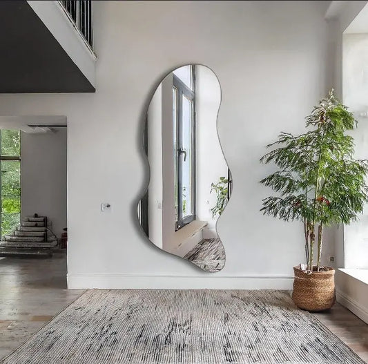 Modern wall mirror with a unique shape in a room 