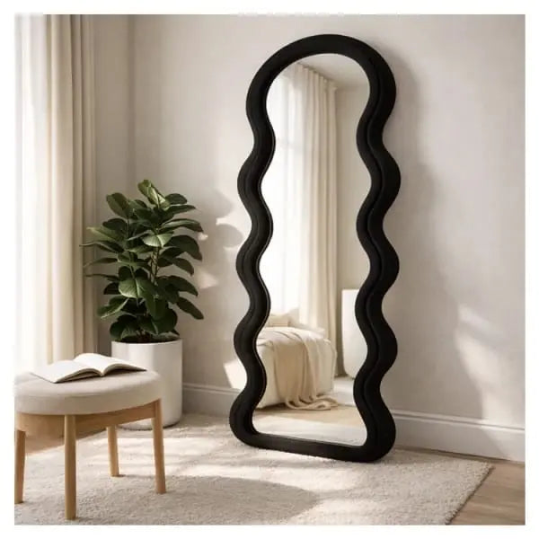 A premium capsule oval standing LED mirror with full ambient frame lighting, 