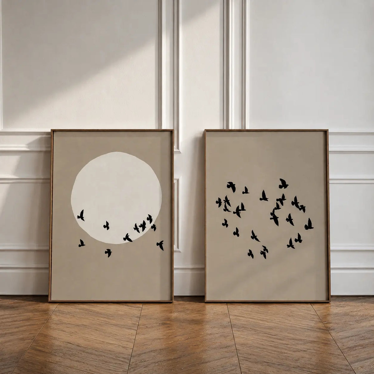 Bird wall art painting set of 2 featuring minimalist bird silhouettes on soft neutral backgrounds in wooden frames by Decorsz Pakistan.