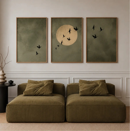 Sage green bird wall decor set of 3 featuring minimalist flying bird artwork, a soft moon composition and warm wooden frames, styled together as a calm three-panel wall display for modern interiors.