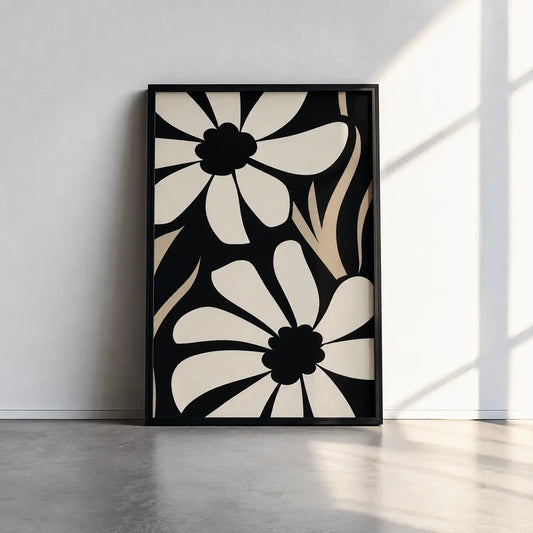 Bold black and white floral wall art with oversized botanical flower forms in a modern framed design for contemporary interiors.