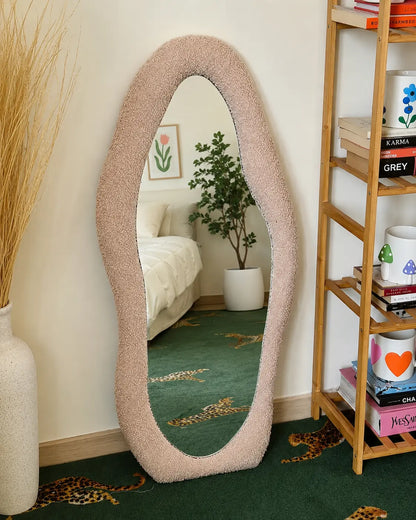 Bouclé full-length mirror with textured fabric frame for modern bedroom decor