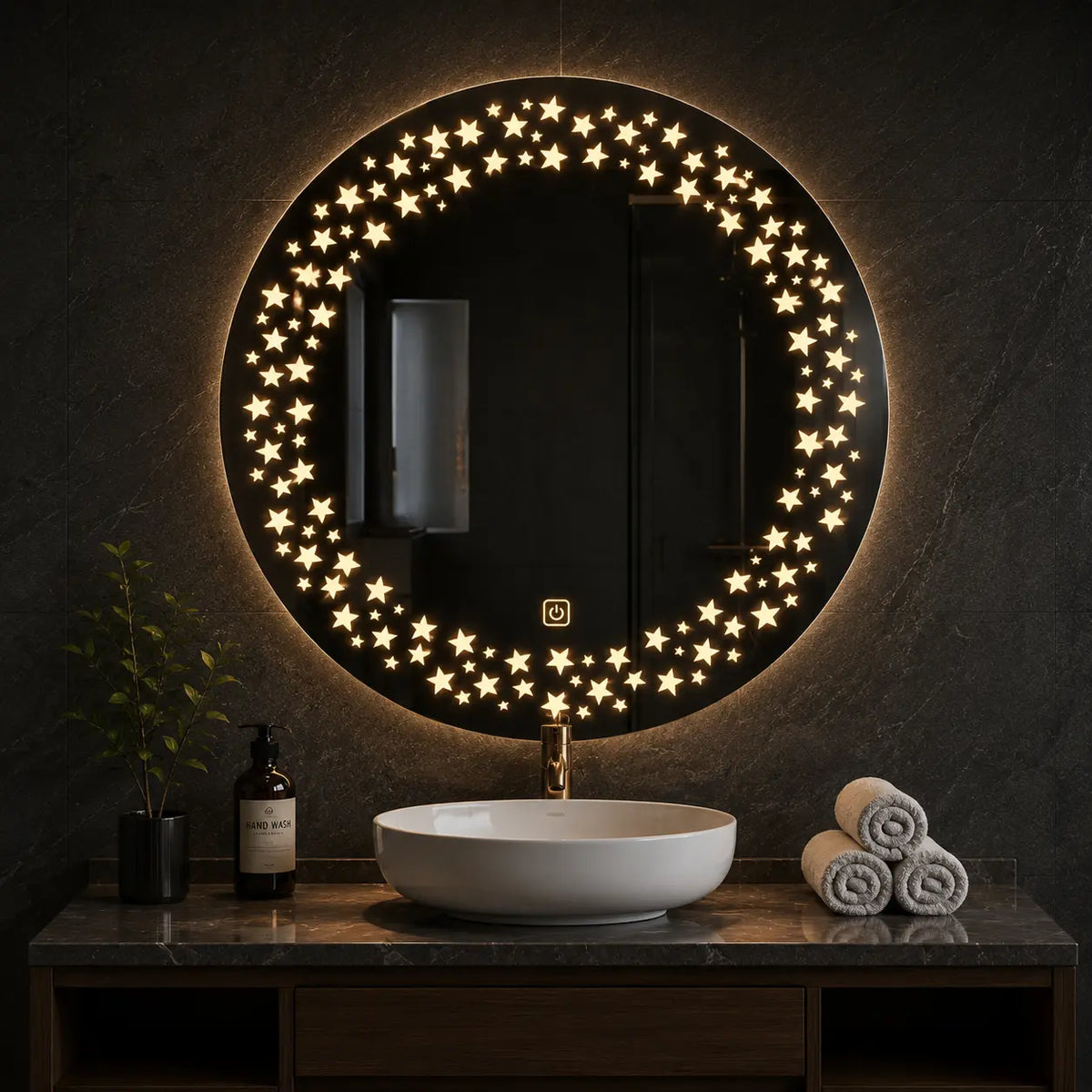 Round LED bathroom mirror with decorative illuminated star pattern above a modern vanity sink