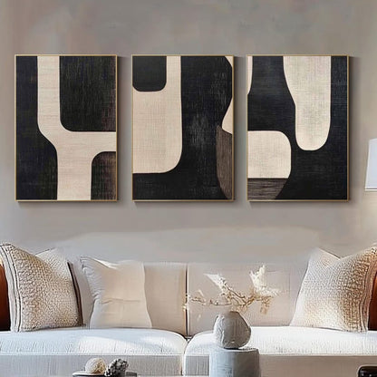 premium wall panels with bold abstract framed artwork above sofa wall