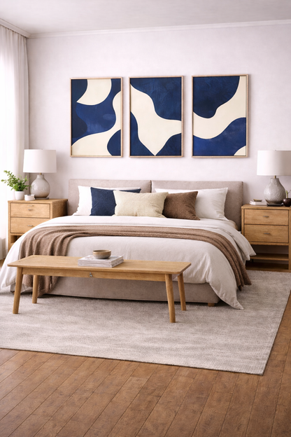 wall decor and hanging with blue abstract framed panels above bedroom wall